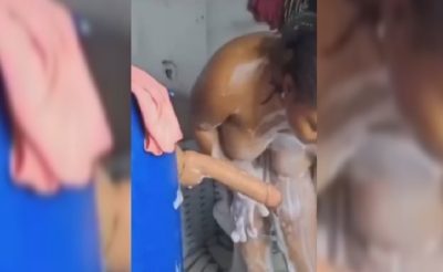 A Naija Woman Bathing With A Dildo